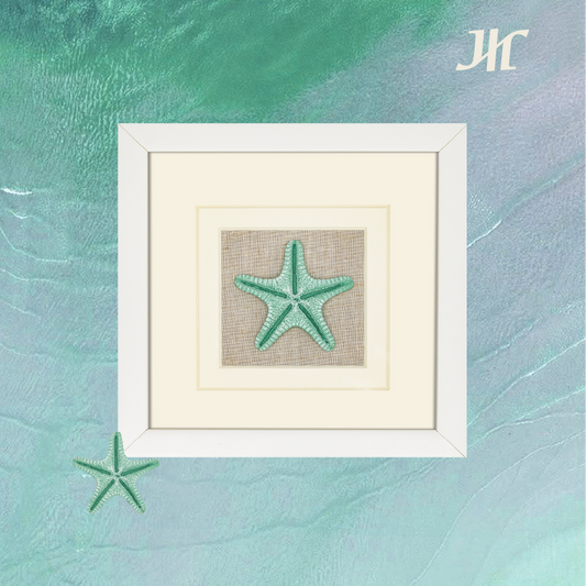Grüner Seestern Wanddeko in Weißem Rahmen